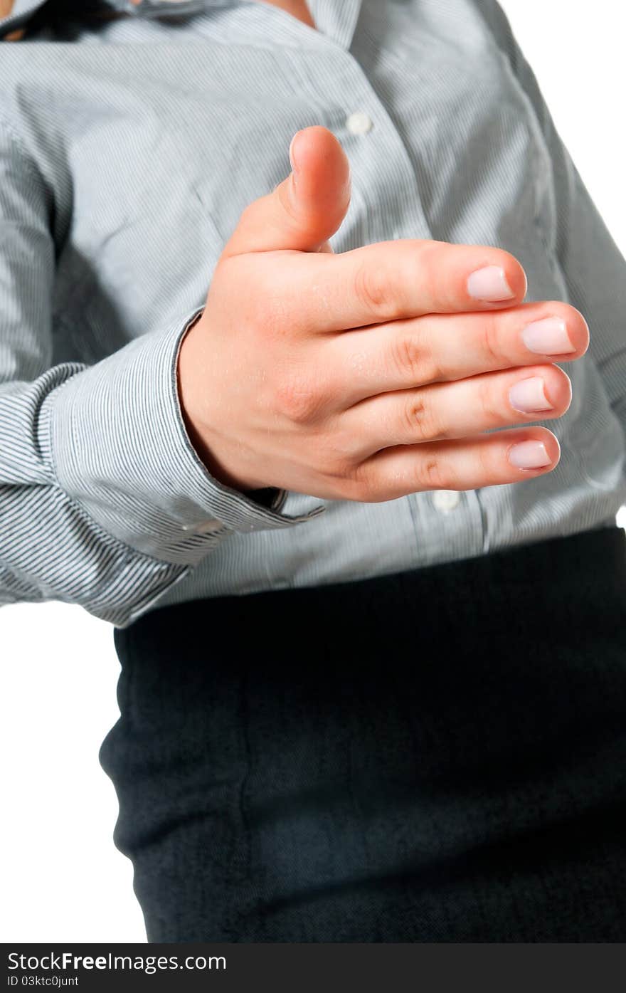 Beautiful young business woman holds out her hand