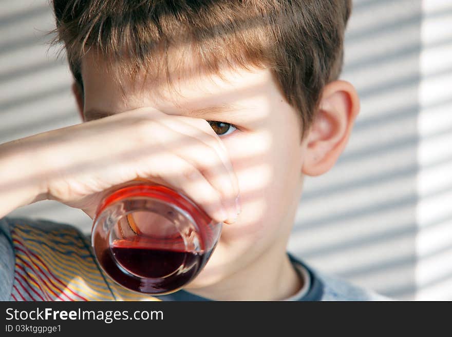 Boy Drinks Juice