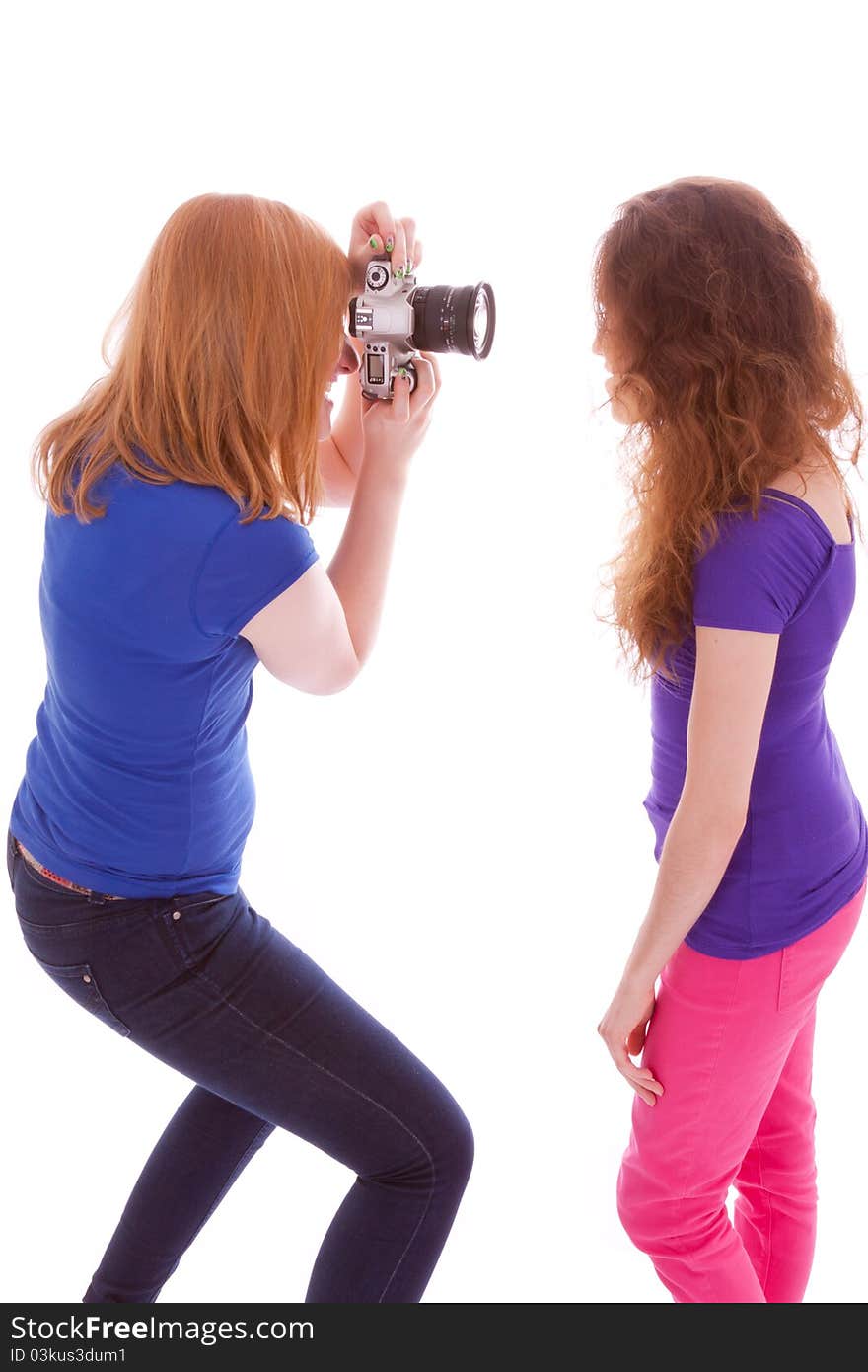 Two young girls are having fun in front of the camera. Two young girls are having fun in front of the camera