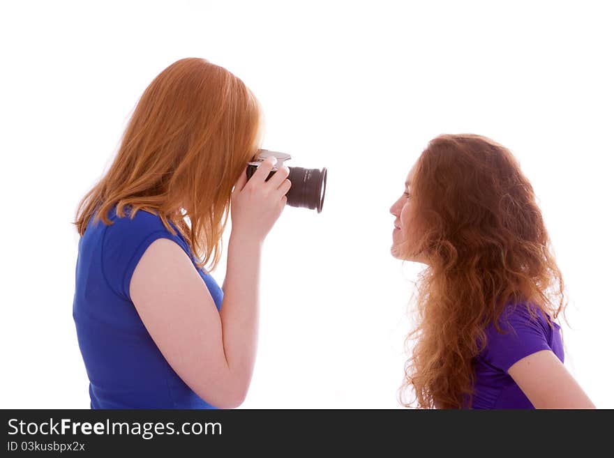 Two young girls are having fun in front of the camera. Two young girls are having fun in front of the camera