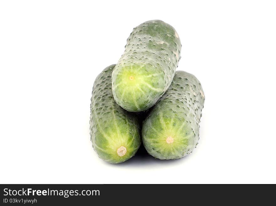 Green cucumber isolated on white background.