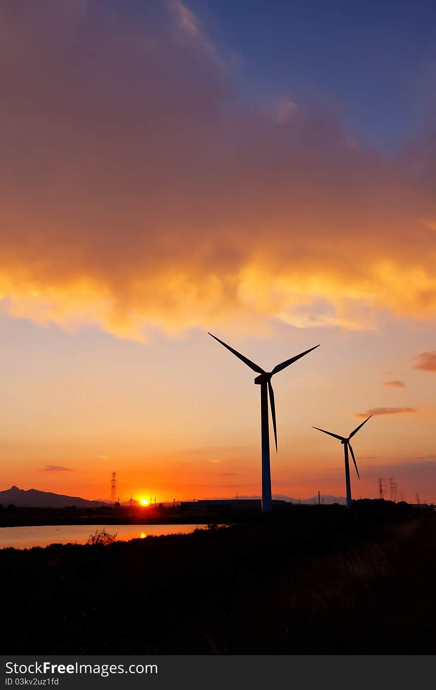 Windturbines At Sunset