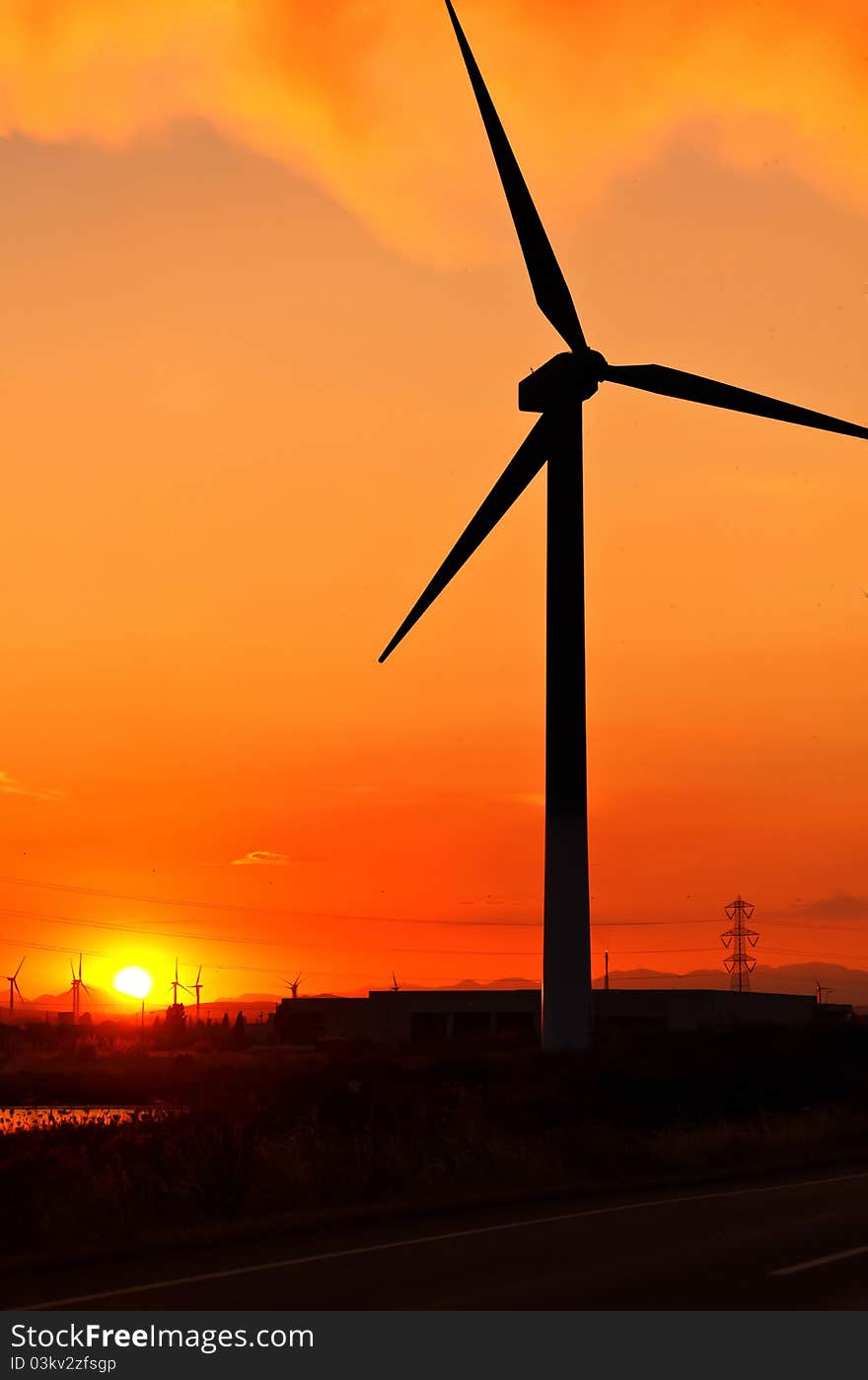 Windturbines at sunset