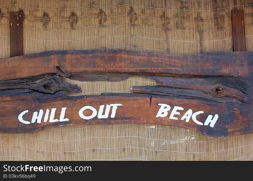 Wooden sign on the beach