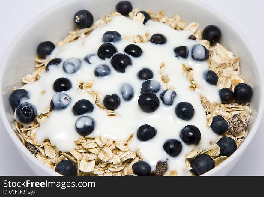 Bowl Of Muesli With Yogurt And Blueberries