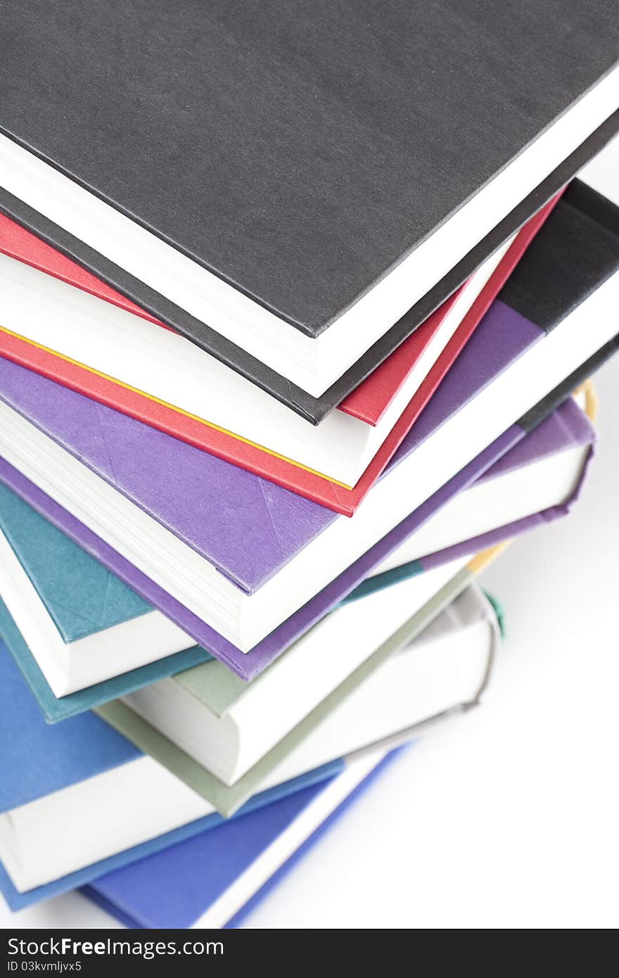 A group of books against a white background