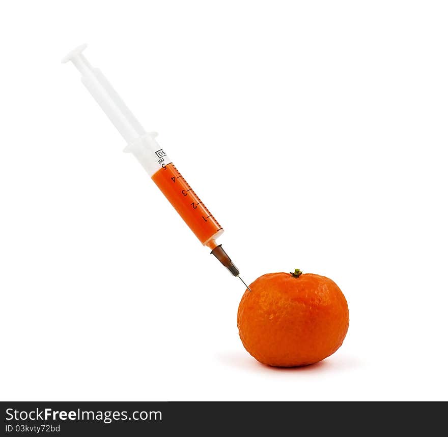 Tangerine with syringe