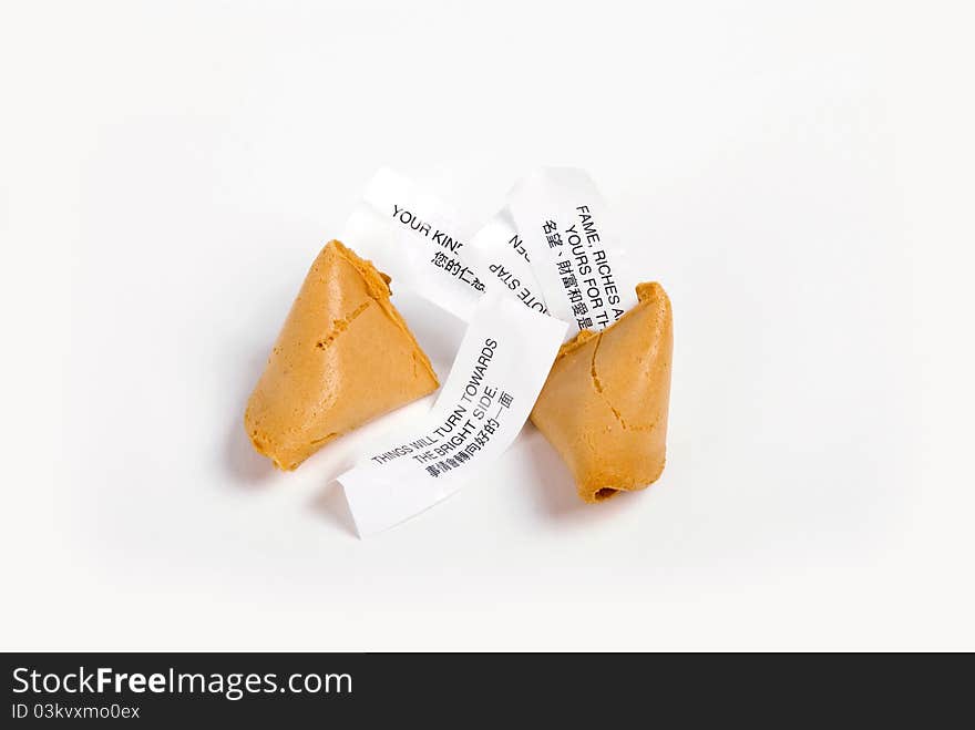 Fortune cookie with several lucky paper stripes. Fortune cookie with several lucky paper stripes.