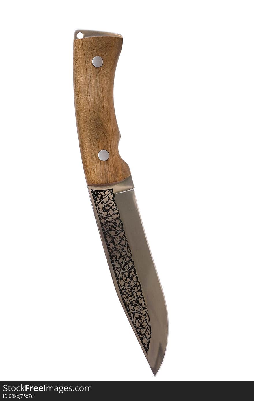 The hunting knife with a beautiful pattern. The hunting knife with a beautiful pattern