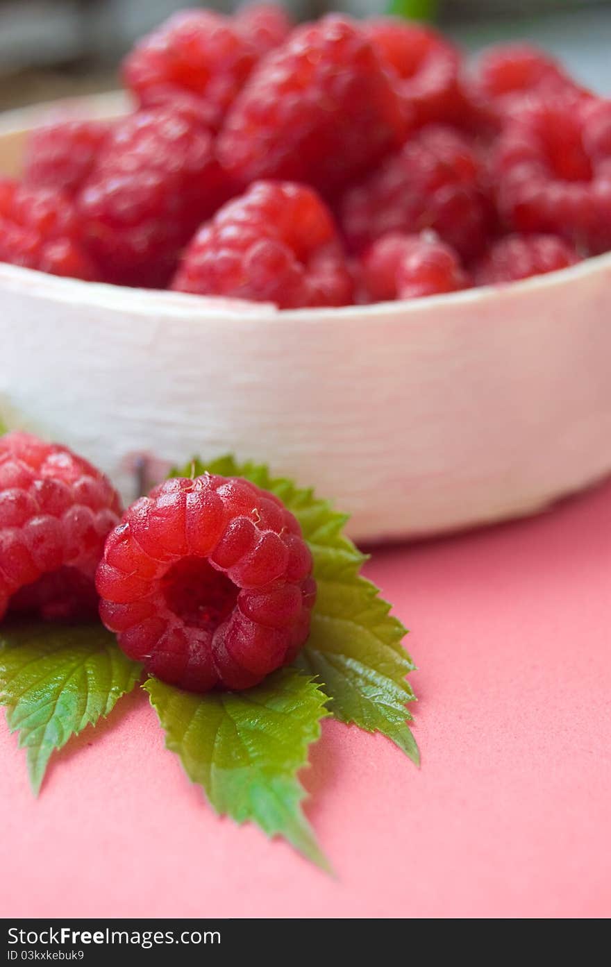 Raspberries In Wooden Basket