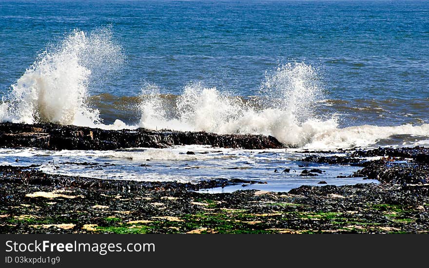 Waves crashing on the rocks. Waves crashing on the rocks