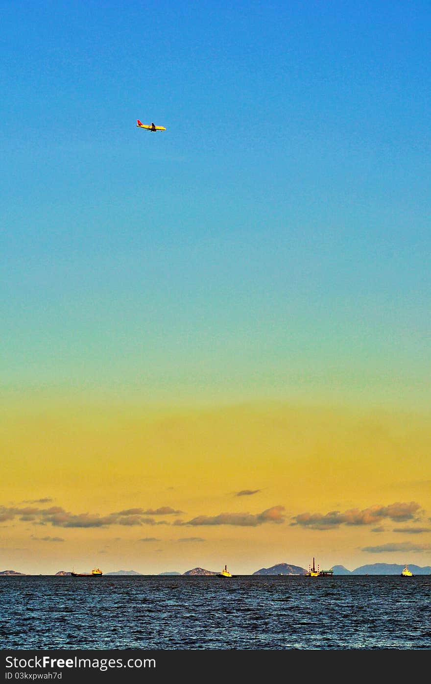 Ship and airplain on the sea near Hongkong Zhuhai Macao bridge site in China Guangdong Pearl river mouth