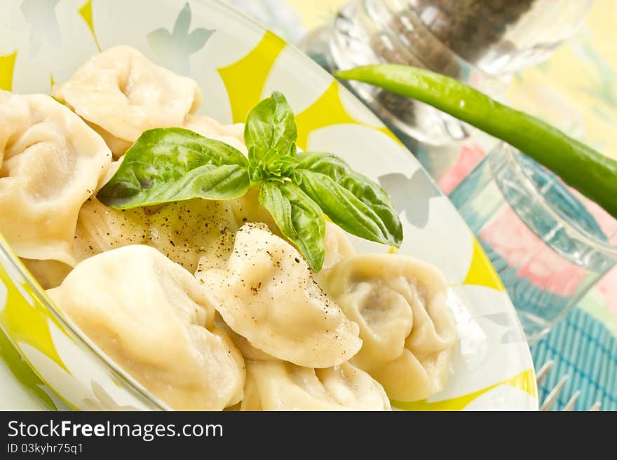 Delicious freshly cooked ravioli on a plate. Delicious freshly cooked ravioli on a plate