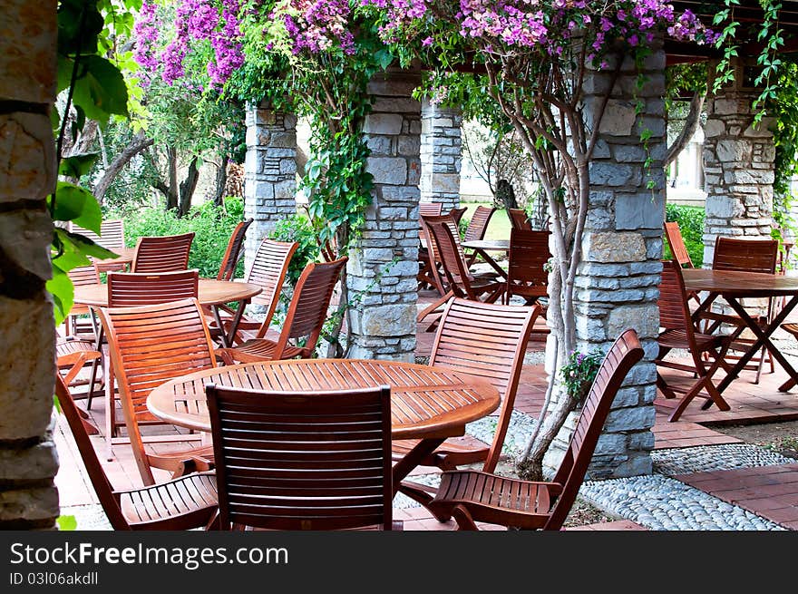 Wooden chairs and table in the  resort . Turkey.