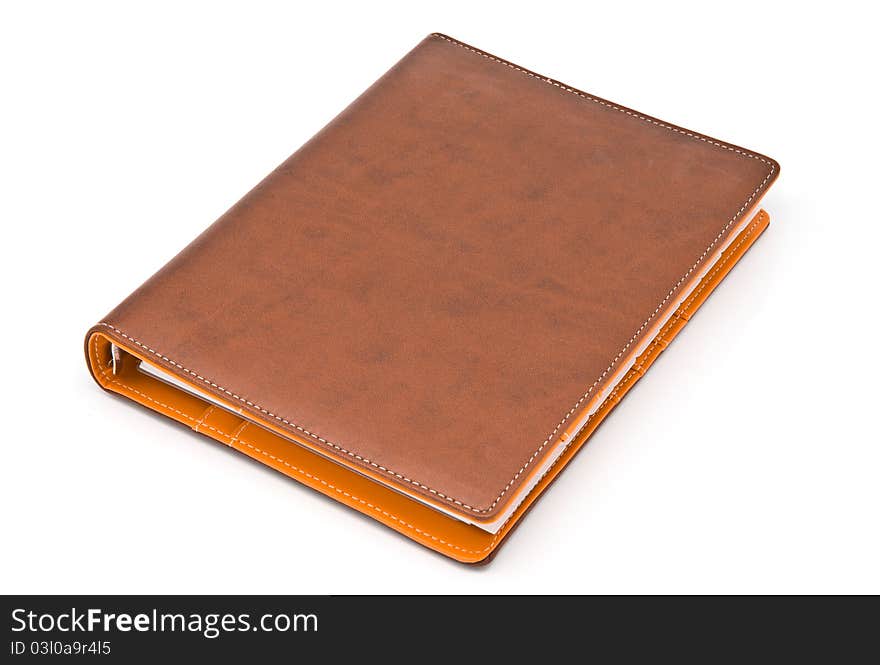 Brown notebook isolated on white background