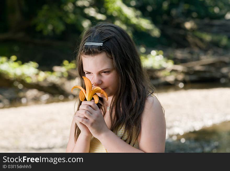 Picture of a young girl near a stream. Picture of a young girl near a stream