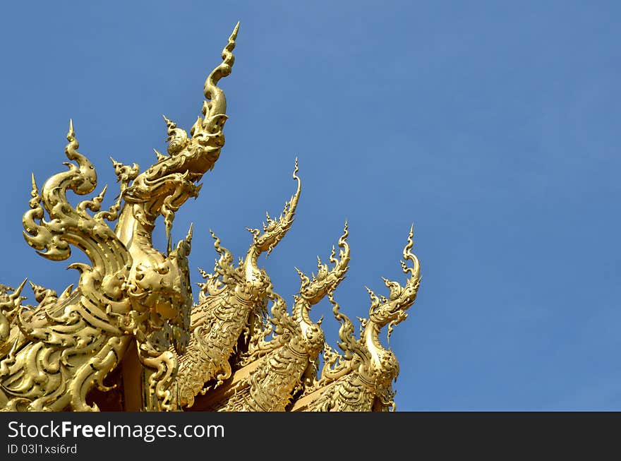 Roof sculptures (Naga) of Wat Rong Khun, Chiangrai, Thailand.