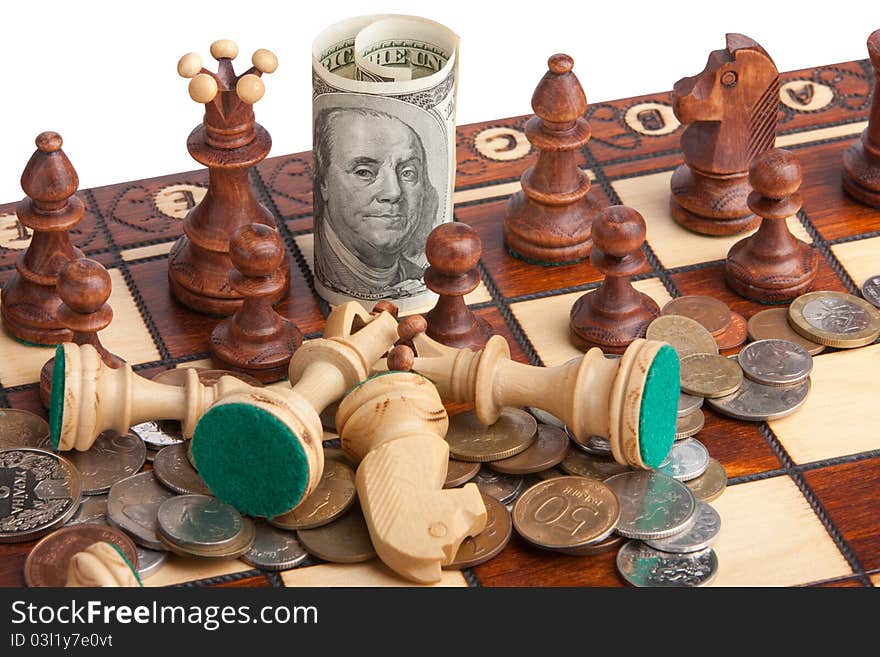 Chess and dollar isolated on a white background