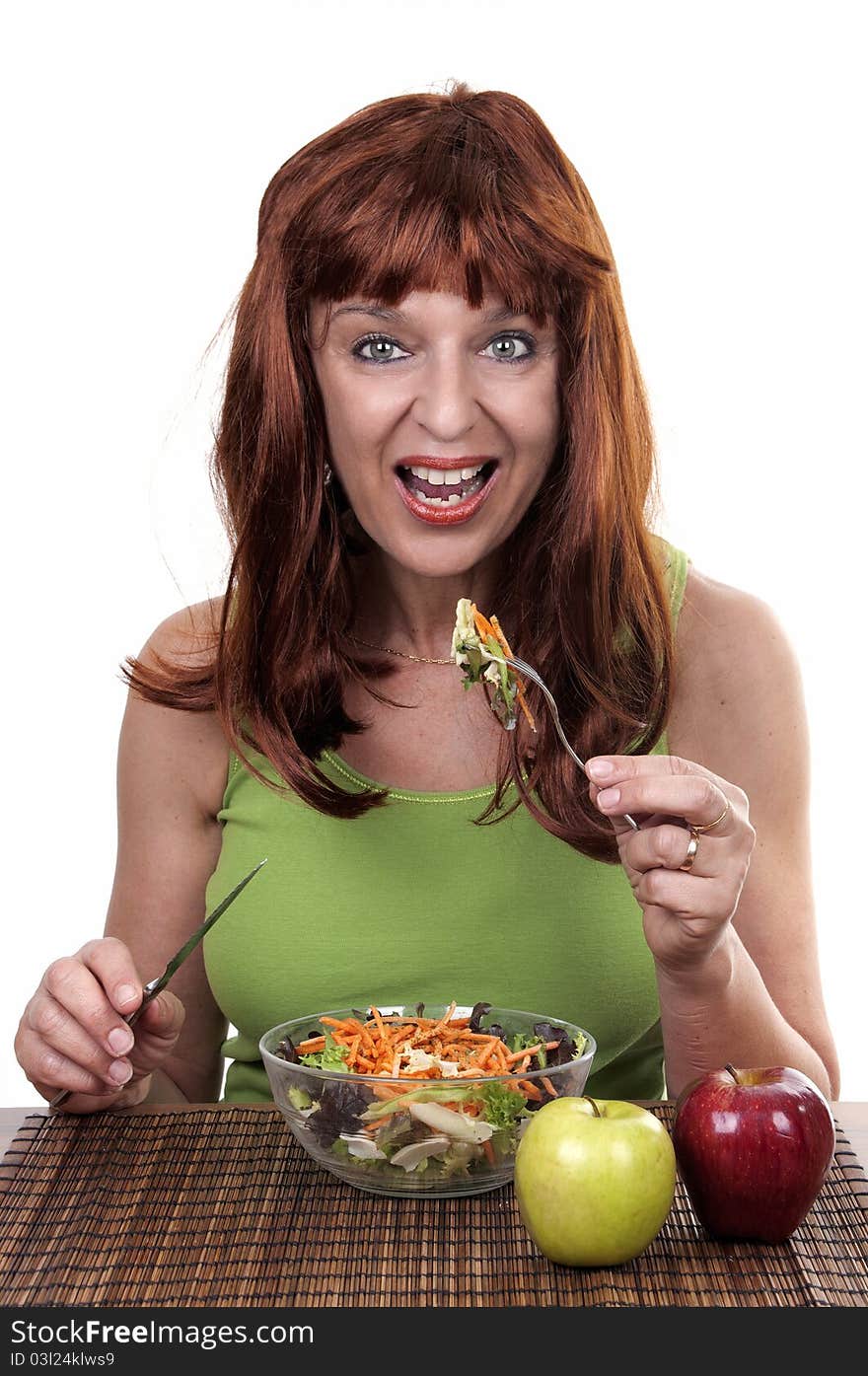 Redhead woman eating