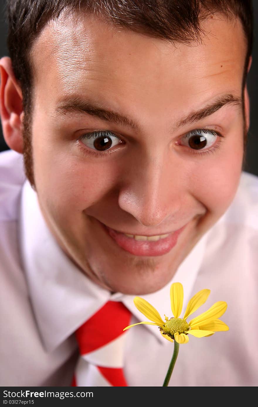 Funny guy with yellow flower. Funny guy with yellow flower