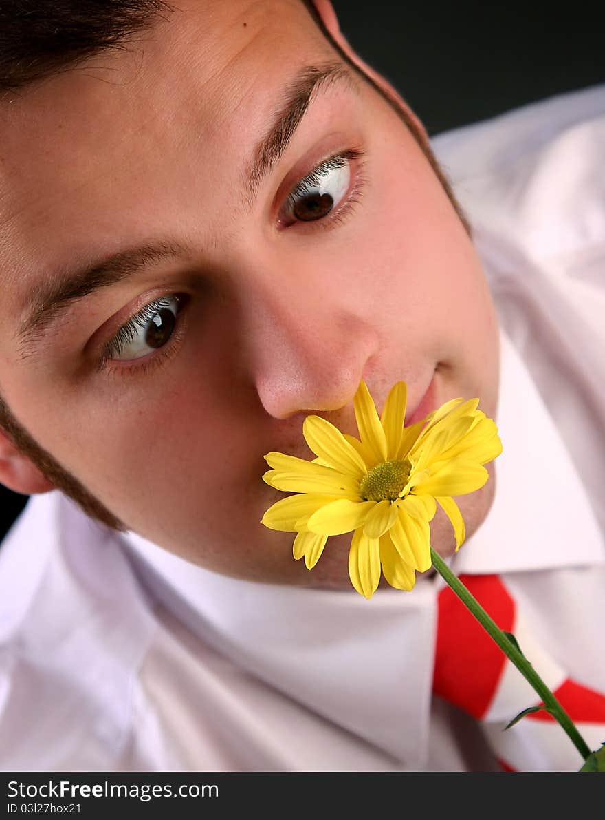 Funny guy with yellow flower. Funny guy with yellow flower