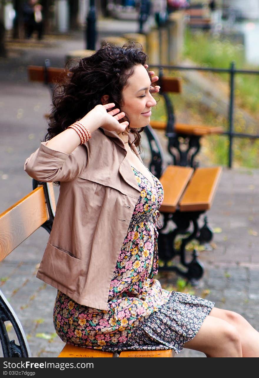 Beautiful woman, hispanic, Latina stretching in the park. Beautiful woman, hispanic, Latina stretching in the park