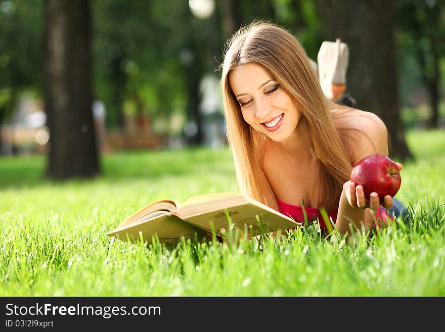 Woman In The Park With Book