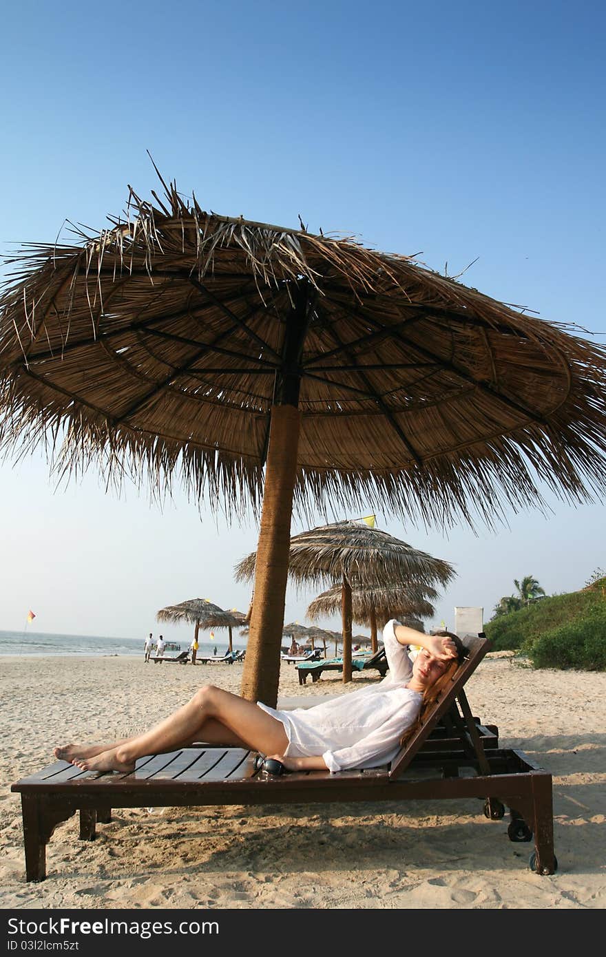 Woman relaxing on the beach