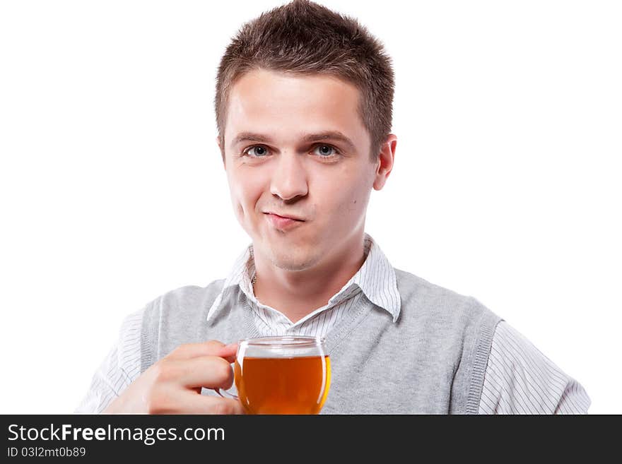 Young man with fresh cup of black tea. Young man with fresh cup of black tea