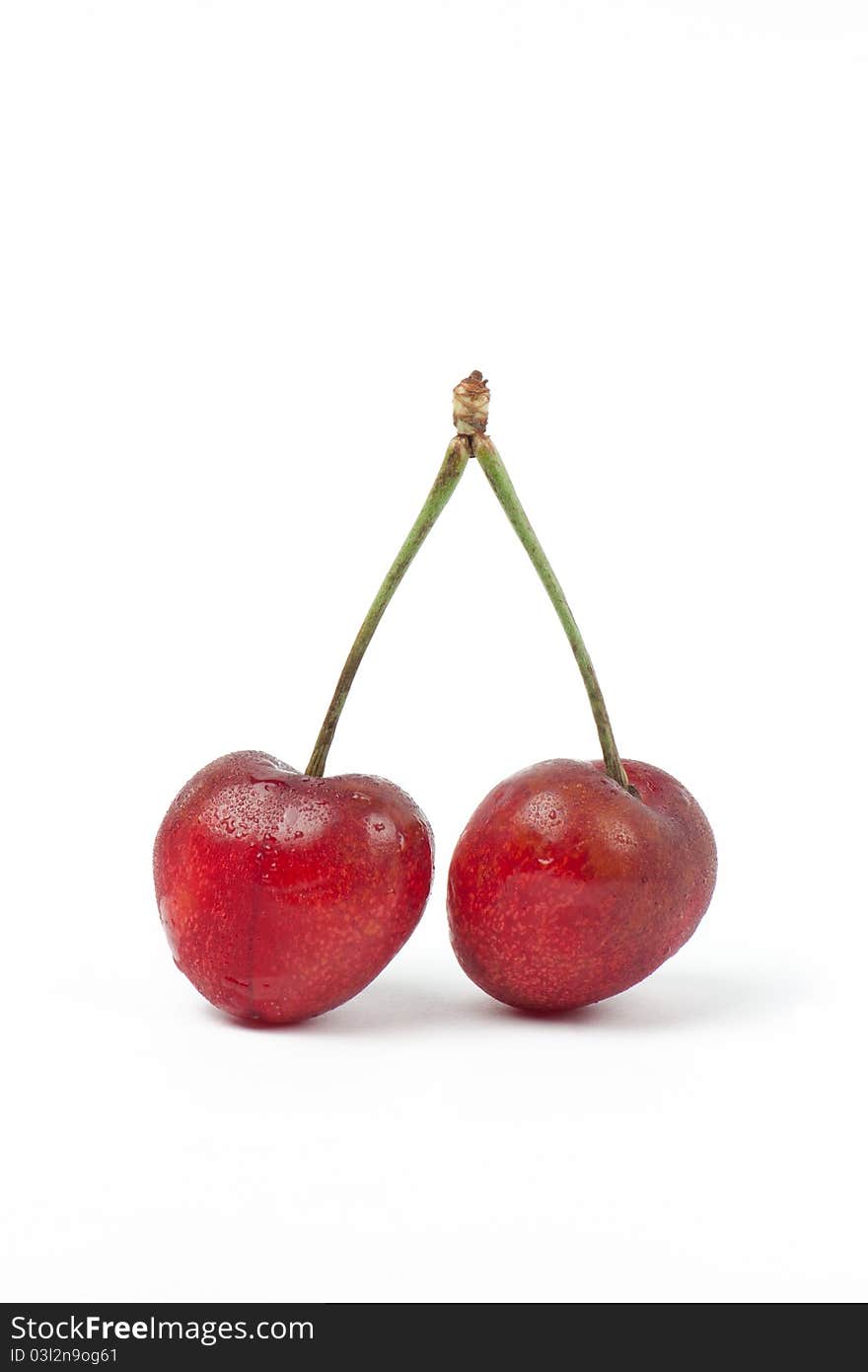 Two sweet Cherries isolated on white background