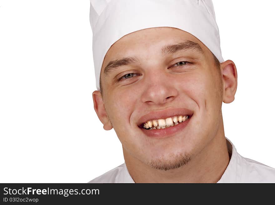 Face of the young cooks in chef's hat.