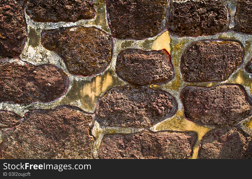 Background and the background. Ames, which made ​​the stone wall.