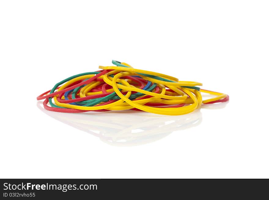 Colorful rubber bands against a white background