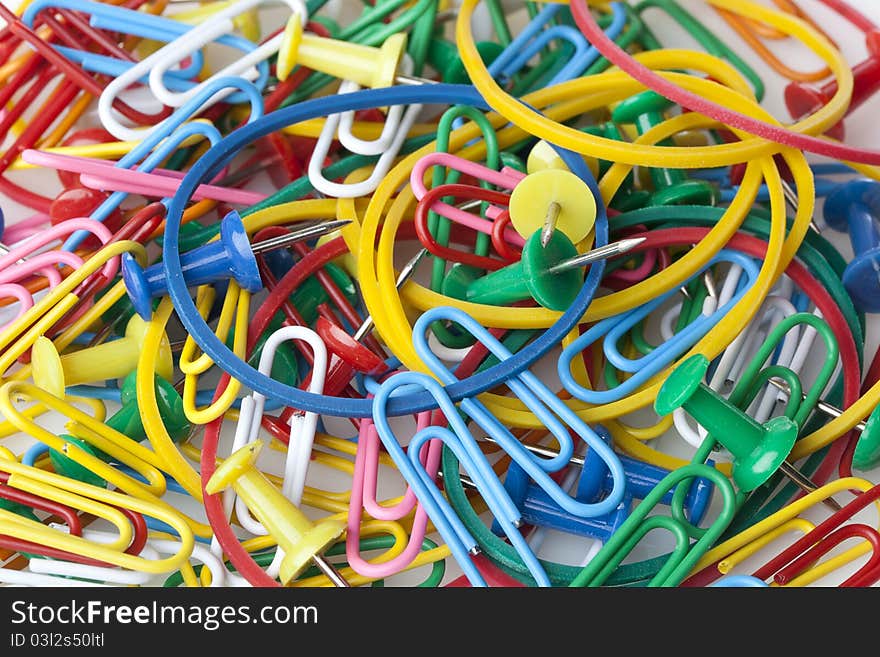 A group of colorful office supplies against a white background