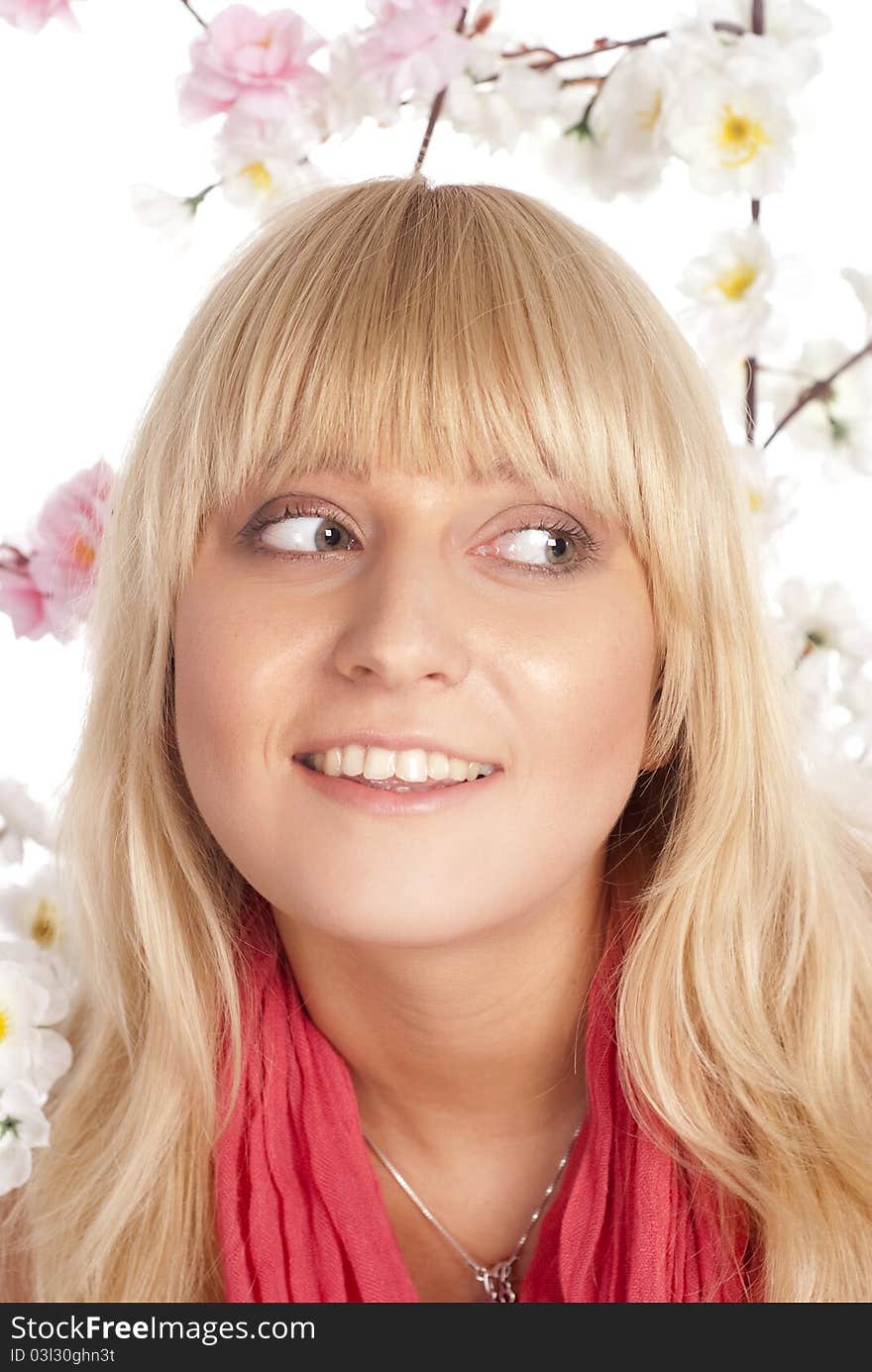 Portrait of a girl among flowers