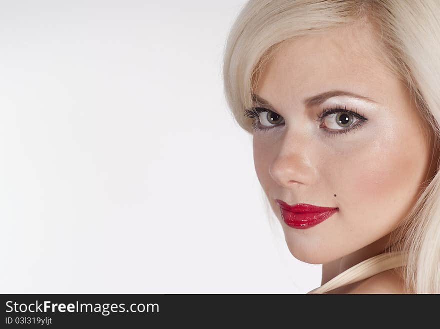 Portrait of a blonde with red lips. Portrait of a blonde with red lips