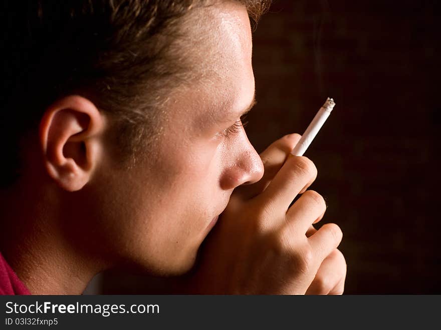 Young guy with cigarette