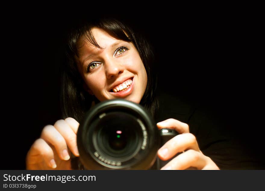 Beautiful girl with camera