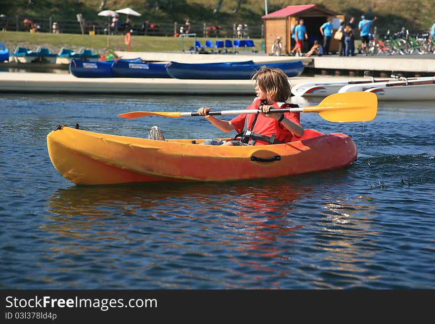 Ten years old boy in a kayak. Ten years old boy in a kayak