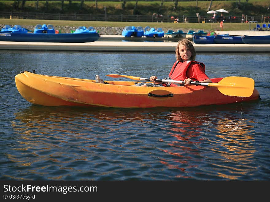 Ten years old boy in a kayak. Ten years old boy in a kayak