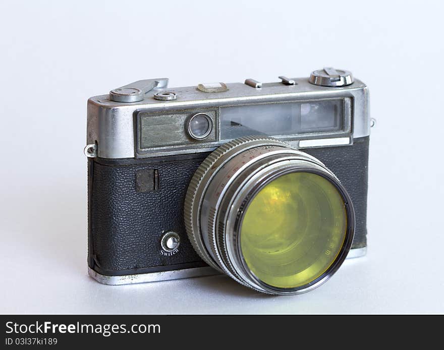 Old camera on white background