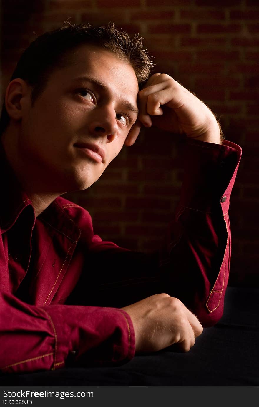 Portrait of a young man in a shirt. Portrait of a young man in a shirt