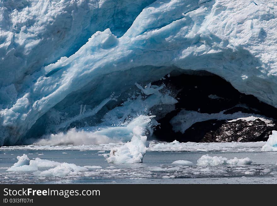 The ceiling of the ice cave under the glacier is breaking. Holgate Glacier, Alaska. The ceiling of the ice cave under the glacier is breaking. Holgate Glacier, Alaska