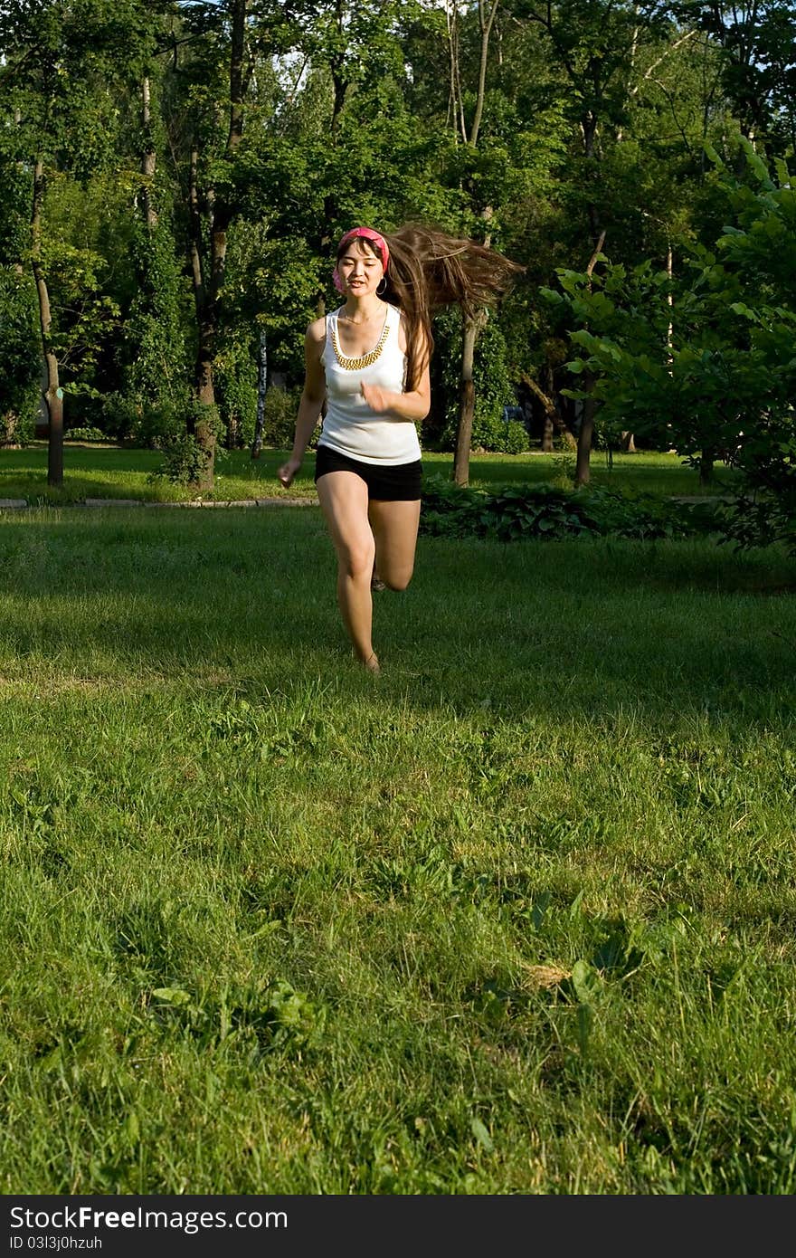 Girl walking outdoor in park