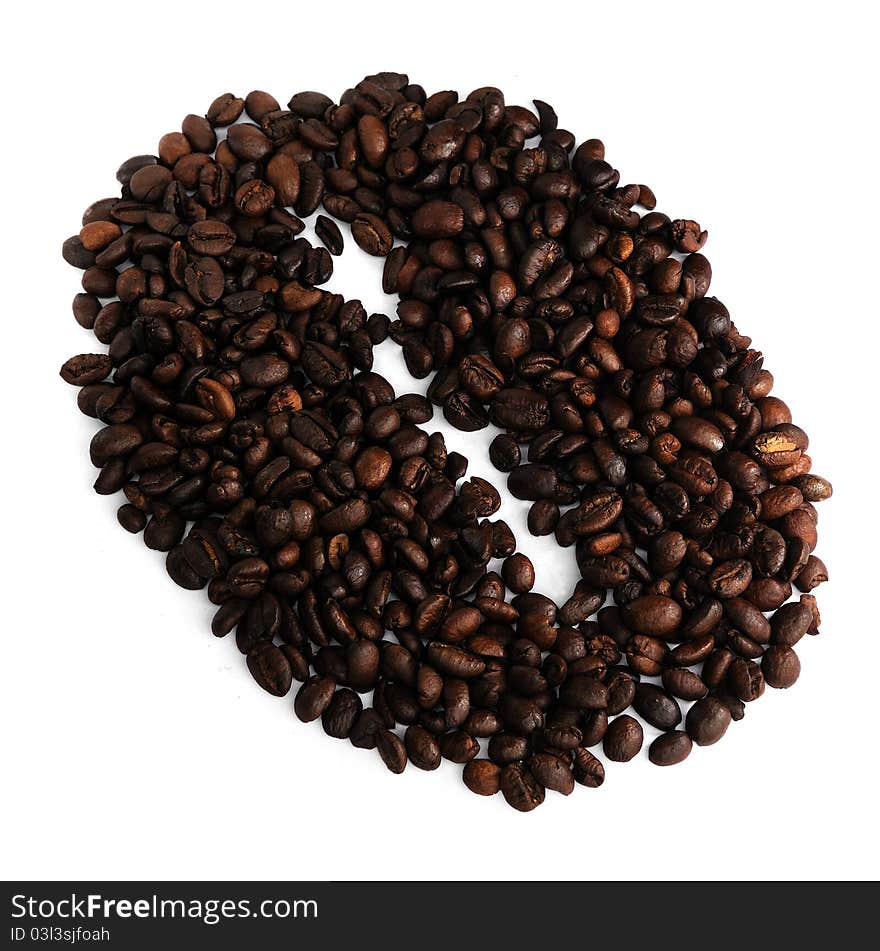 Pile of roasted coffee in “Big Coffee Bean”  shape isolated on a white background.