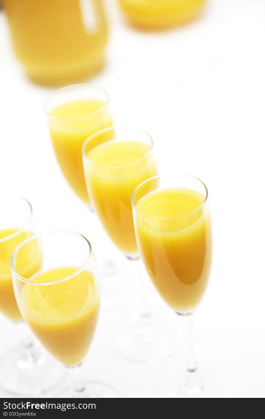 Many glasses of fresh orange juice