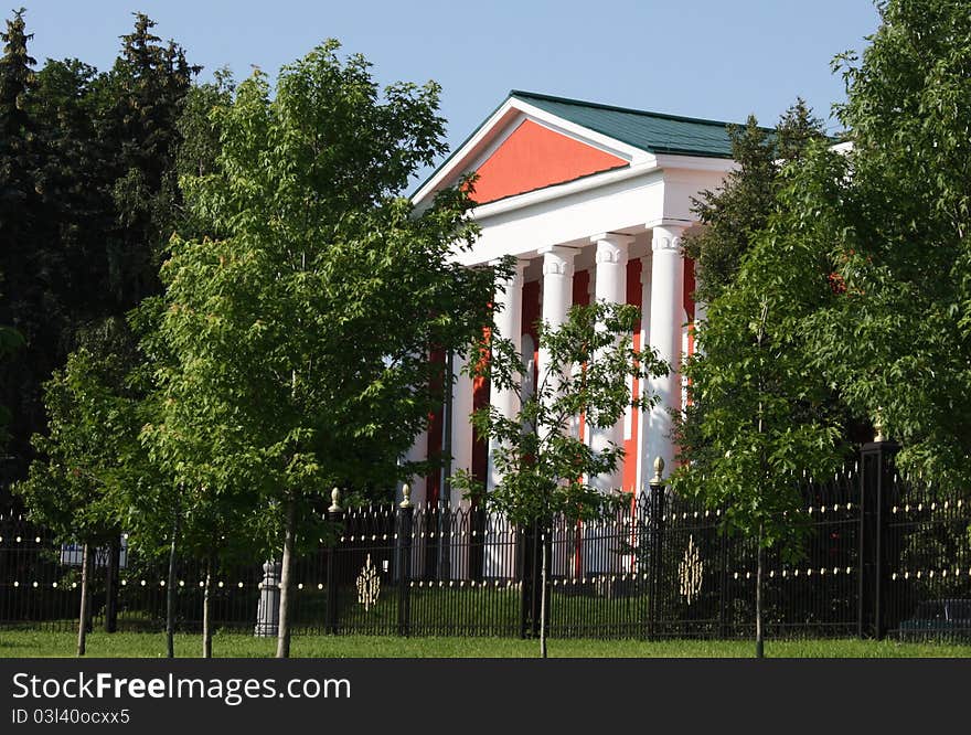 Red House Behind The Trees