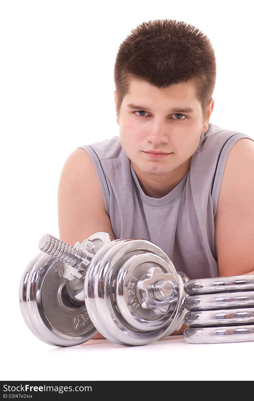 Portrait of a young and healthy man with dumbbell. Portrait of a young and healthy man with dumbbell