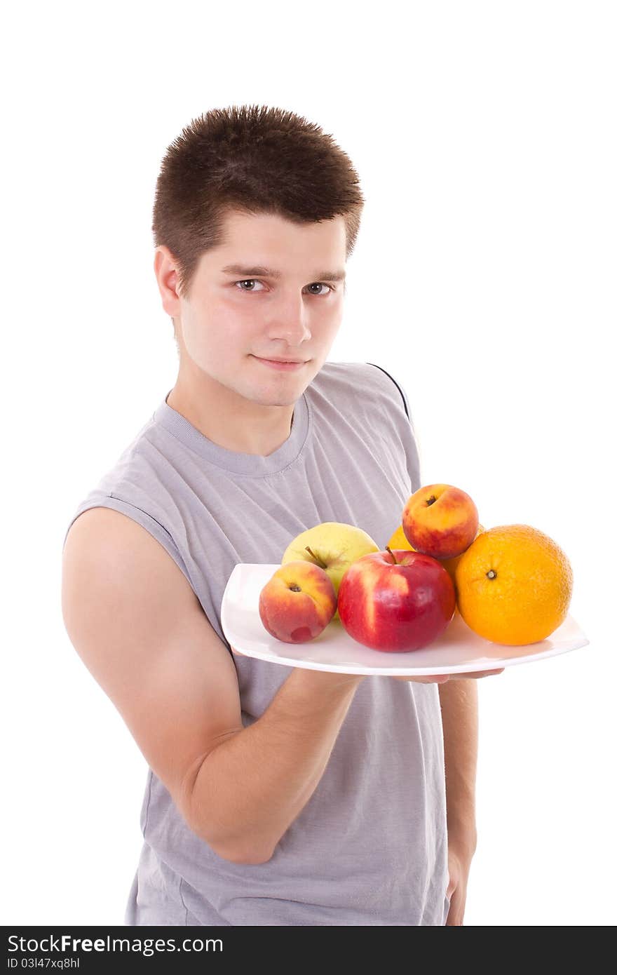 Young healthy man hold fruits. Young healthy man hold fruits