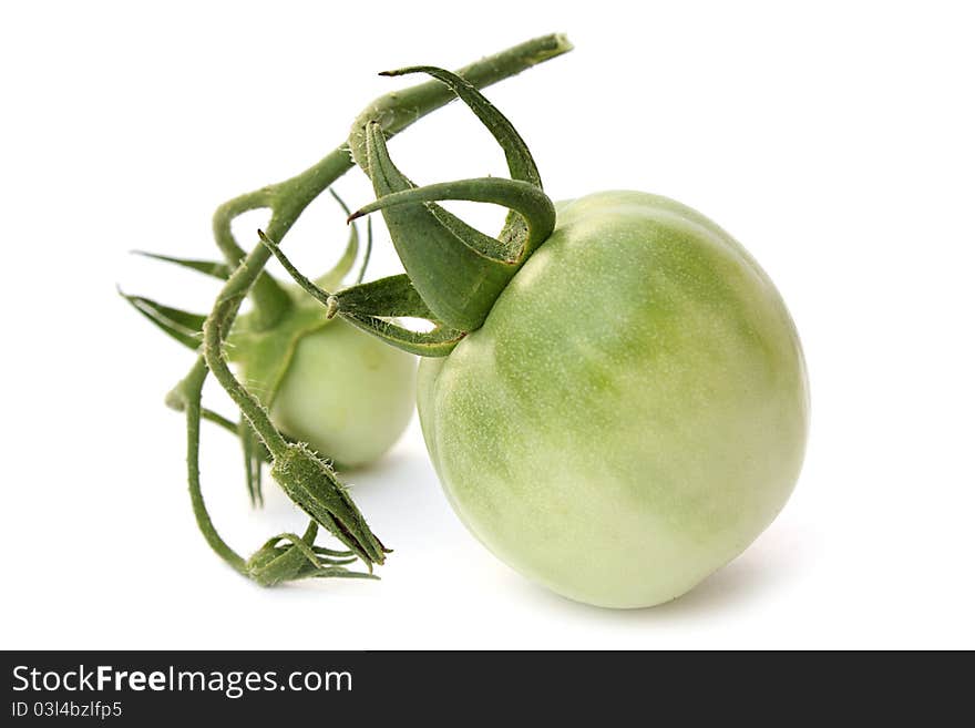 Fresh tomatoes on a white background close-up isolated. Fresh tomatoes on a white background close-up isolated